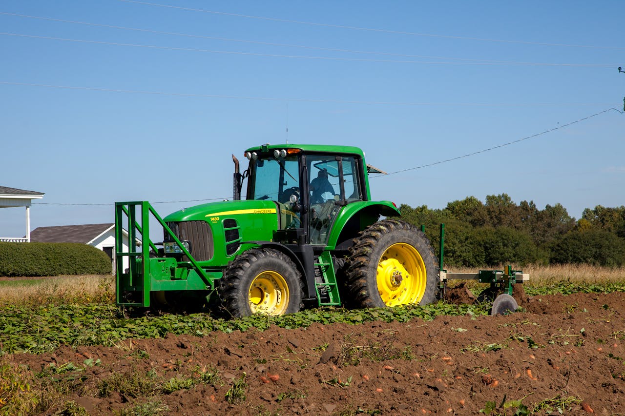 Tractor Plowing Field